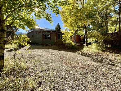 Charming mountain retreat located in the desirable Valle on El Valle Escondido Golf Course in New Mexico - for sale on GolfHomes.com, golf home, golf lot