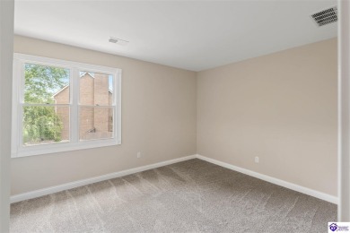 Welcome to this beautifully renovated 4-bedroom, 2.5-bath home on Elizabethtown Country Club in Kentucky - for sale on GolfHomes.com, golf home, golf lot