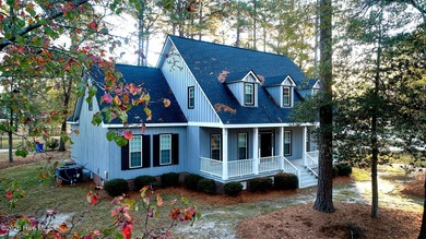 Located on a corner lot at Wilson Country Club overlooking Hole on Wilson Country Club in North Carolina - for sale on GolfHomes.com, golf home, golf lot