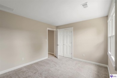 Welcome to this beautifully renovated 4-bedroom, 2.5-bath home on Elizabethtown Country Club in Kentucky - for sale on GolfHomes.com, golf home, golf lot