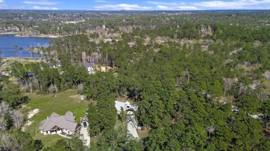 This charming 2-bedroom, 2-bath custom-built home sits on a on Rayburn Country Club in Texas - for sale on GolfHomes.com, golf home, golf lot