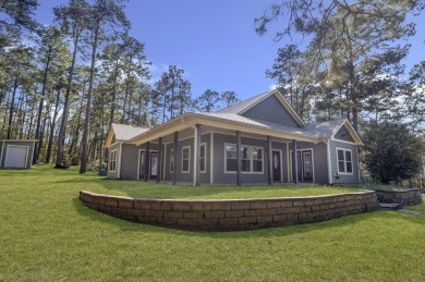 This charming 2-bedroom, 2-bath custom-built home sits on a on Rayburn Country Club in Texas - for sale on GolfHomes.com, golf home, golf lot