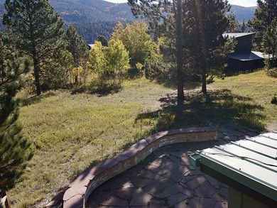 Charming mountain retreat located in the desirable Valle on El Valle Escondido Golf Course in New Mexico - for sale on GolfHomes.com, golf home, golf lot