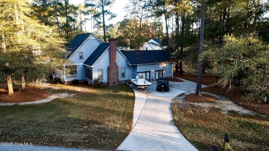 Located on a corner lot at Wilson Country Club overlooking Hole on Wilson Country Club in North Carolina - for sale on GolfHomes.com, golf home, golf lot