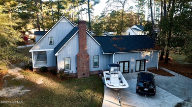 Located on a corner lot at Wilson Country Club overlooking Hole on Wilson Country Club in North Carolina - for sale on GolfHomes.com, golf home, golf lot