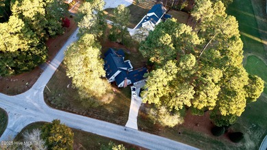 Located on a corner lot at Wilson Country Club overlooking Hole on Wilson Country Club in North Carolina - for sale on GolfHomes.com, golf home, golf lot