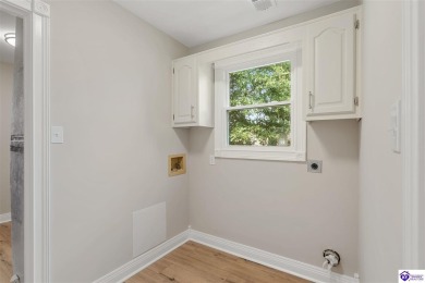 Welcome to this beautifully renovated 4-bedroom, 2.5-bath home on Elizabethtown Country Club in Kentucky - for sale on GolfHomes.com, golf home, golf lot