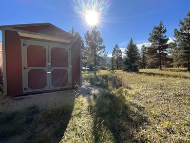 Charming mountain retreat located in the desirable Valle on El Valle Escondido Golf Course in New Mexico - for sale on GolfHomes.com, golf home, golf lot