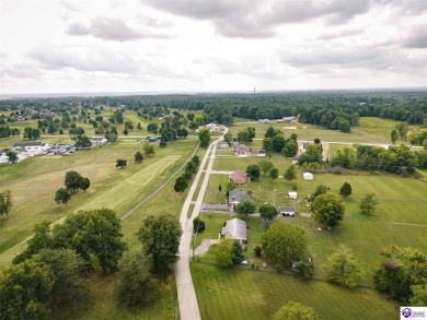 Welcome to this beautifully renovated 4-bedroom, 2.5-bath home on Elizabethtown Country Club in Kentucky - for sale on GolfHomes.com, golf home, golf lot