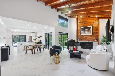 Tucked behind the gates of Boca Greens, this updated 2BD/2BA on Boca Greens Country Club in Florida - for sale on GolfHomes.com, golf home, golf lot