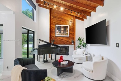 Tucked behind the gates of Boca Greens, this updated 2BD/2BA on Boca Greens Country Club in Florida - for sale on GolfHomes.com, golf home, golf lot