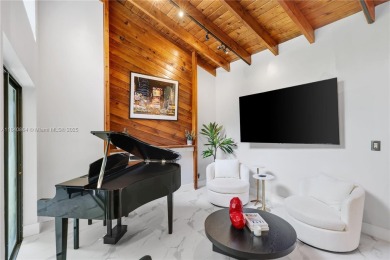 Tucked behind the gates of Boca Greens, this updated 2BD/2BA on Boca Greens Country Club in Florida - for sale on GolfHomes.com, golf home, golf lot