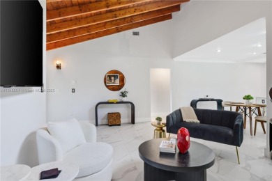 Tucked behind the gates of Boca Greens, this updated 2BD/2BA on Boca Greens Country Club in Florida - for sale on GolfHomes.com, golf home, golf lot