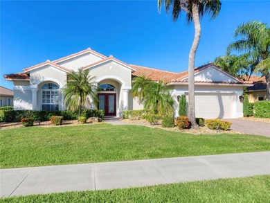 Enjoy tranquil lake views from this beautifully updated on Pelican Pointe Golf and Country Club in Florida - for sale on GolfHomes.com, golf home, golf lot
