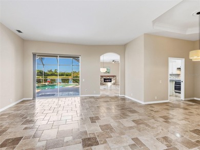 Enjoy tranquil lake views from this beautifully updated on Pelican Pointe Golf and Country Club in Florida - for sale on GolfHomes.com, golf home, golf lot