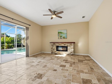 Enjoy tranquil lake views from this beautifully updated on Pelican Pointe Golf and Country Club in Florida - for sale on GolfHomes.com, golf home, golf lot