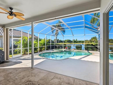 Enjoy tranquil lake views from this beautifully updated on Pelican Pointe Golf and Country Club in Florida - for sale on GolfHomes.com, golf home, golf lot