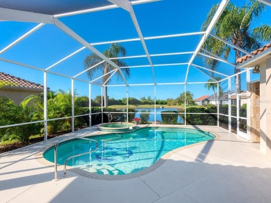 Enjoy tranquil lake views from this beautifully updated on Pelican Pointe Golf and Country Club in Florida - for sale on GolfHomes.com, golf home, golf lot