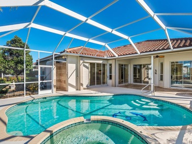Enjoy tranquil lake views from this beautifully updated on Pelican Pointe Golf and Country Club in Florida - for sale on GolfHomes.com, golf home, golf lot