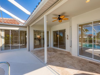 Enjoy tranquil lake views from this beautifully updated on Pelican Pointe Golf and Country Club in Florida - for sale on GolfHomes.com, golf home, golf lot