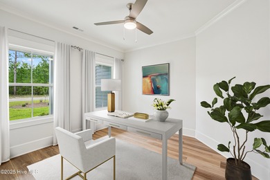 Discover the Skiff, a beautiful new Logan Home, located in on Sea Trail Golf Resort in North Carolina - for sale on GolfHomes.com, golf home, golf lot