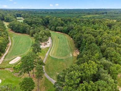 121 Buffalo Dr: where custom character meets craftsman charm on River Golf and Country Club at Lake Royale in North Carolina - for sale on GolfHomes.com, golf home, golf lot