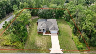 Brand new and move-in ready, this 4-bedroom, 3-bathroom pool on Pine Ridge Community Golf and Country Club in Florida - for sale on GolfHomes.com, golf home, golf lot