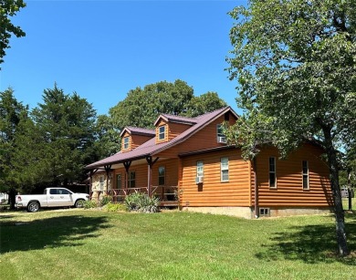 RUSTIC 1 1/2 STORY HOME NESTLED ON 3.11 ACRES IN A PARK LIKE on Pineridge Golf Course in Missouri - for sale on GolfHomes.com, golf home, golf lot