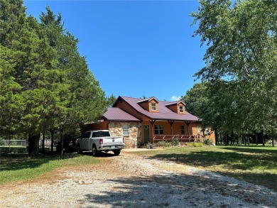 RUSTIC 1 1/2 STORY HOME NESTLED ON 3.11 ACRES IN A PARK LIKE on Pineridge Golf Course in Missouri - for sale on GolfHomes.com, golf home, golf lot