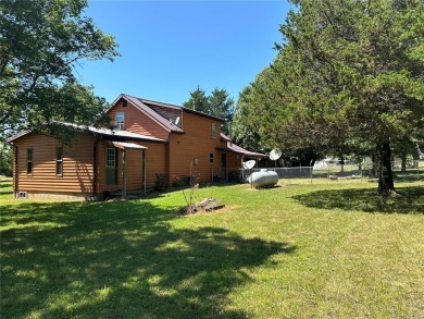 RUSTIC 1 1/2 STORY HOME NESTLED ON 3.11 ACRES IN A PARK LIKE on Pineridge Golf Course in Missouri - for sale on GolfHomes.com, golf home, golf lot