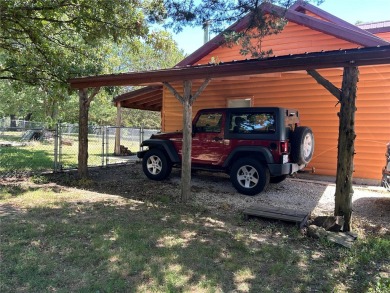 RUSTIC 1 1/2 STORY HOME NESTLED ON 3.11 ACRES IN A PARK LIKE on Pineridge Golf Course in Missouri - for sale on GolfHomes.com, golf home, golf lot