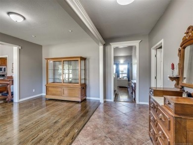 Welcome to this beautiful 4-bedroom, 3.5 bath home in the highly on  in Oklahoma - for sale on GolfHomes.com, golf home, golf lot