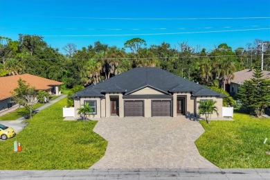 Welcome to this beautifully crafted TURNKEY duplex, offering on Rotonda Golf and Country Club The Palms Course in Florida - for sale on GolfHomes.com, golf home, golf lot