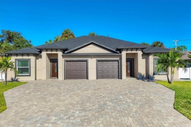 Welcome to this beautifully crafted TURNKEY duplex, offering on Rotonda Golf and Country Club The Palms Course in Florida - for sale on GolfHomes.com, golf home, golf lot