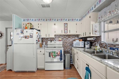 COME TO SUNNY FLORIDA! Whether you're escaping the winter chill on The Links of Lake Bernadette in Florida - for sale on GolfHomes.com, golf home, golf lot