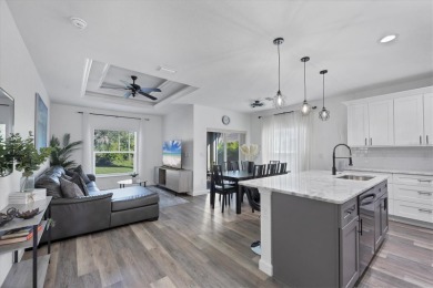 Welcome to this beautifully crafted TURNKEY duplex, offering on Rotonda Golf and Country Club The Palms Course in Florida - for sale on GolfHomes.com, golf home, golf lot