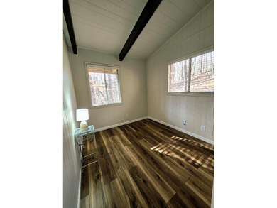 Escape to your serene retreat in the woods. Nestled above Lake on Hide-A-Way Hills Golf Club in Ohio - for sale on GolfHomes.com, golf home, golf lot