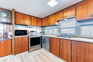 This spacious 2-bedroom, 1.5-bath single-wide home with on Betmar Acres Golf Club in Florida - for sale on GolfHomes.com, golf home, golf lot