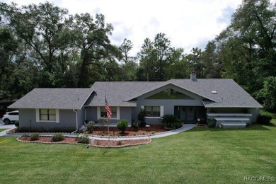 Spacious one owner POOL home nestled on two spacious lots on on Citrus Springs Country Club in Florida - for sale on GolfHomes.com, golf home, golf lot