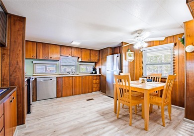 This spacious 2-bedroom, 1.5-bath single-wide home with on Betmar Acres Golf Club in Florida - for sale on GolfHomes.com, golf home, golf lot