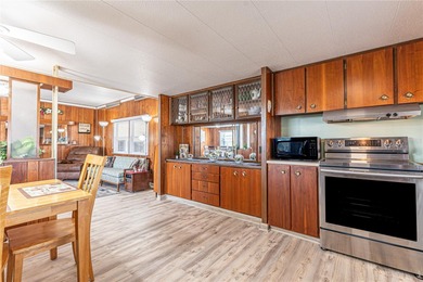 This spacious 2-bedroom, 1.5-bath single-wide home with on Betmar Acres Golf Club in Florida - for sale on GolfHomes.com, golf home, golf lot