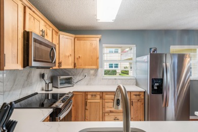 It's ALL about the VIEW! Well cared for & updated ground floor on The American Golf Club in Florida - for sale on GolfHomes.com, golf home, golf lot