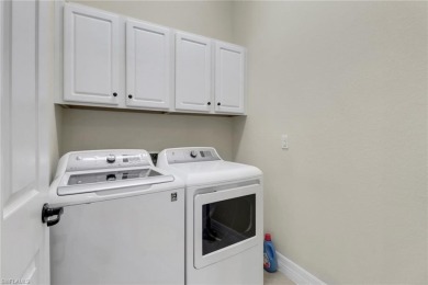 Beautifully maintained Stanford model in Bonita National on Bonita National Golf Course in Florida - for sale on GolfHomes.com, golf home, golf lot