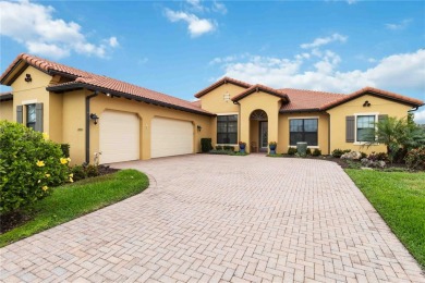 Welcome to 10953 Bullrush Drive, where luxury meets serene golf on Sarasota National Golf Club in Florida - for sale on GolfHomes.com, golf home, golf lot