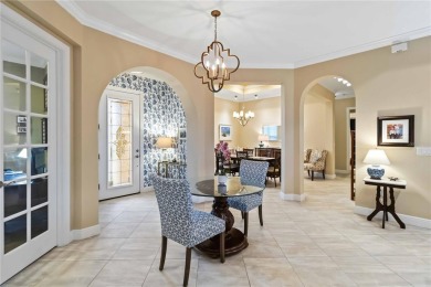 Welcome to 10953 Bullrush Drive, where luxury meets serene golf on Sarasota National Golf Club in Florida - for sale on GolfHomes.com, golf home, golf lot