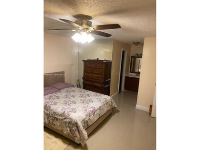 Large 2-bedroom 2-bathroom condominium on the golf course. Guard on Inverrary Country Club in Florida - for sale on GolfHomes.com, golf home, golf lot