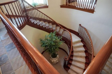 Stunning custom estate on the 1st hole fairway of the on Highland Springs Country Club in Missouri - for sale on GolfHomes.com, golf home, golf lot