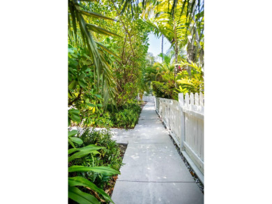 This charming Poolside Key West Golf Club home is ready for you on Key West Golf Club in Florida - for sale on GolfHomes.com, golf home, golf lot