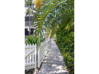 This charming Poolside Key West Golf Club home is ready for you on Key West Golf Club in Florida - for sale on GolfHomes.com, golf home, golf lot