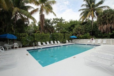 This charming Poolside Key West Golf Club home is ready for you on Key West Golf Club in Florida - for sale on GolfHomes.com, golf home, golf lot